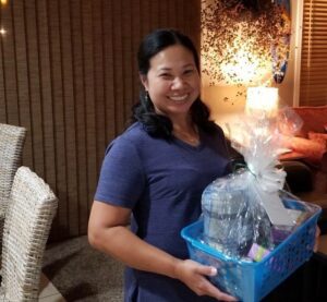 local hero receiving gift basket