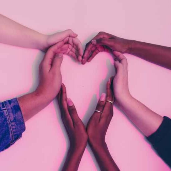 hands from different people making a heart
